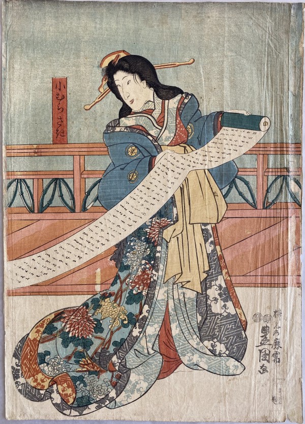 Woman holds a scroll