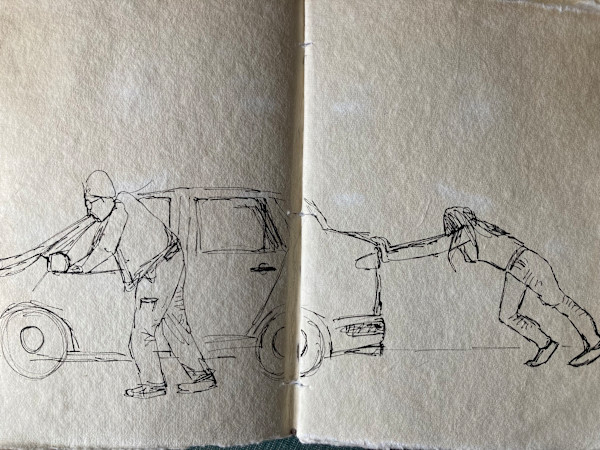 Pushing the car by Fflur Donnghaile