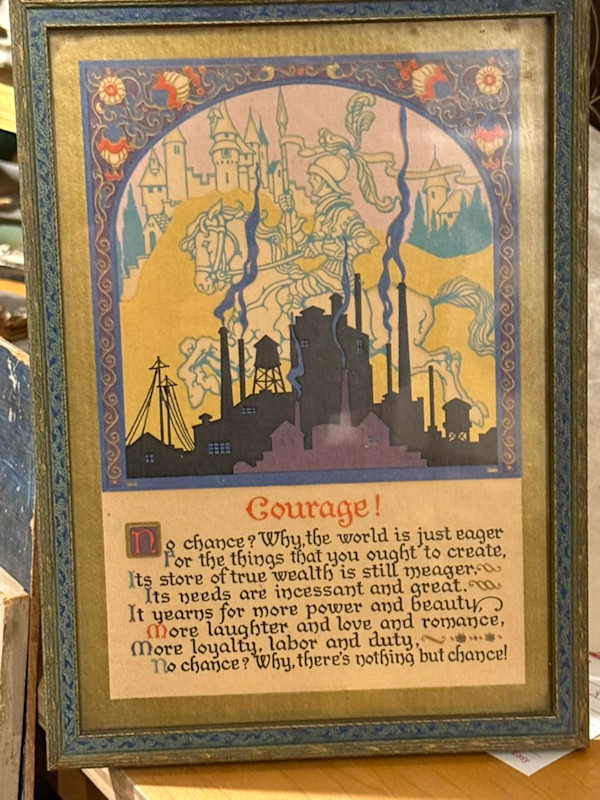 Framed motto "Courage"
