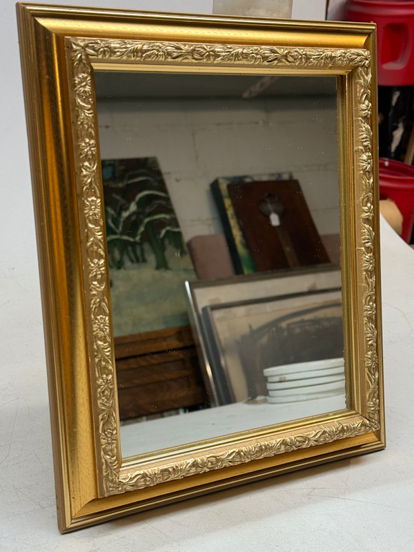 Ornate gold mirror