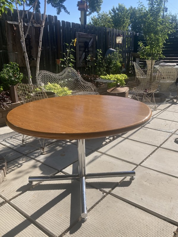 Round oak chrome base table