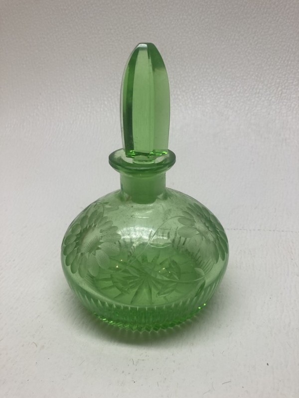 Emerald green perfume bottle by Perfume