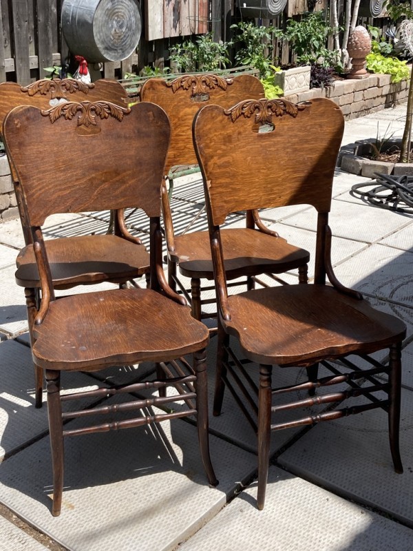 4 matching pressed back chairs