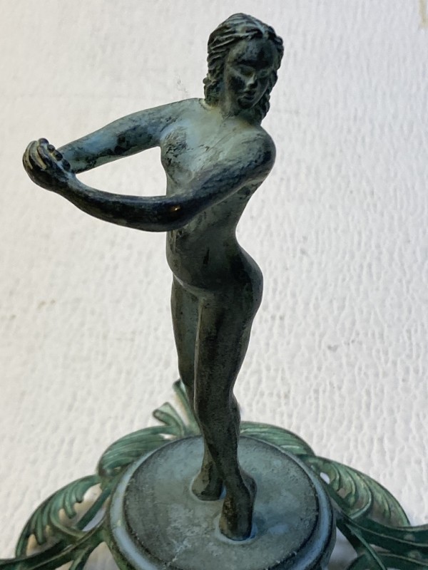 Art Deco bud vase holding metal figure