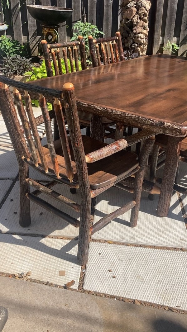 hand  made log table and 6 chairs