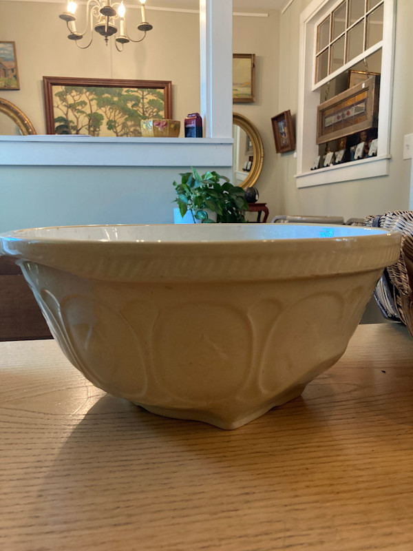 Pottery mixing bowl with white interior