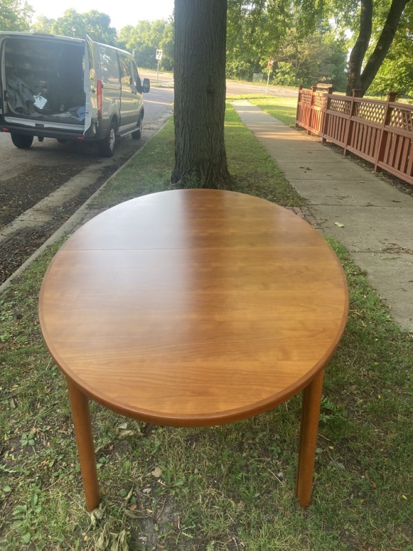 Danish modern teak dining table with 2 leaves