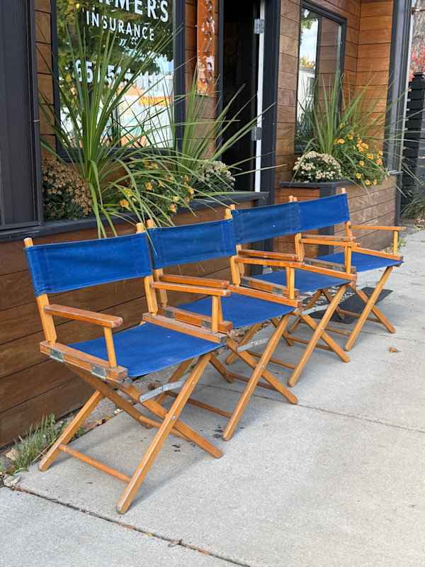 pair of blue directors chairs