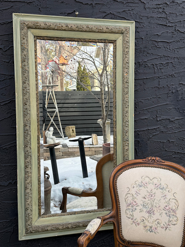 Beveled mirror in Victorian frame