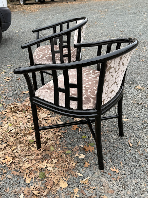 Pair of Asian black lacquered arm chairs
