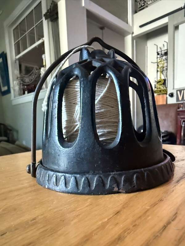 Victorian iron string holder