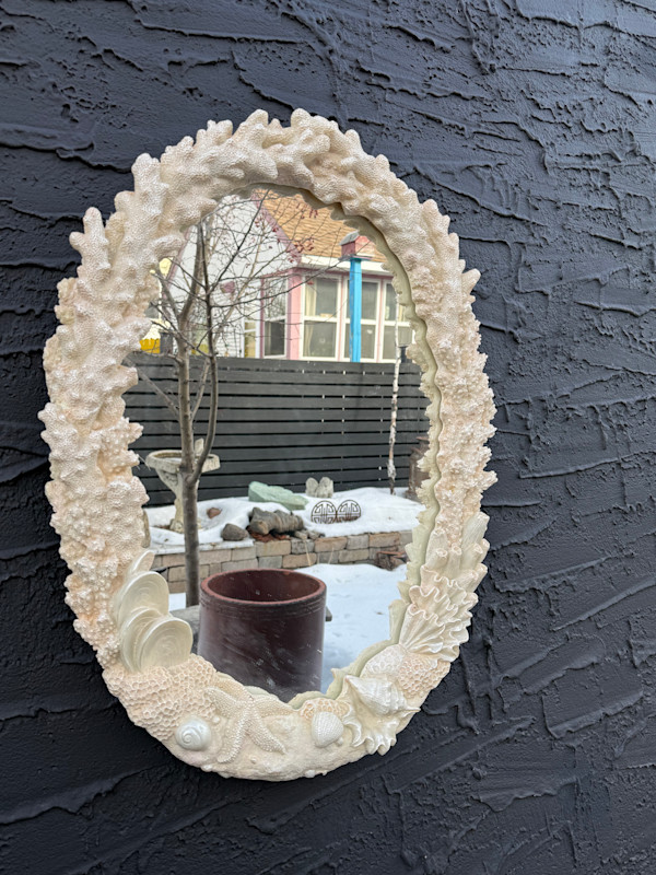 Oval sea shell motif mirror