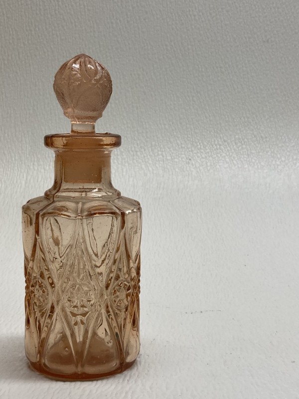 Art Deco pink pressed glass perfume bottle by Perfume