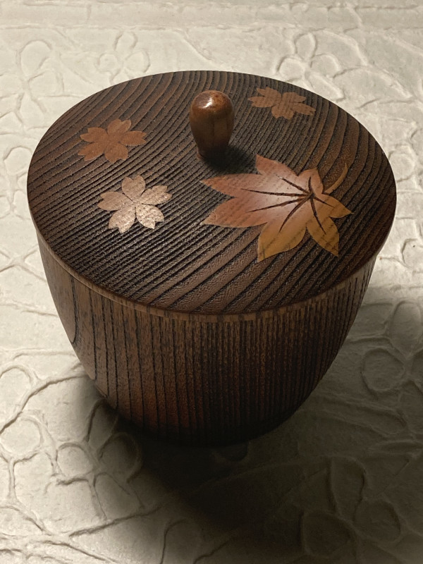 carved leaf decorated wooden vase