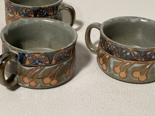 4 hand made pottery mugs