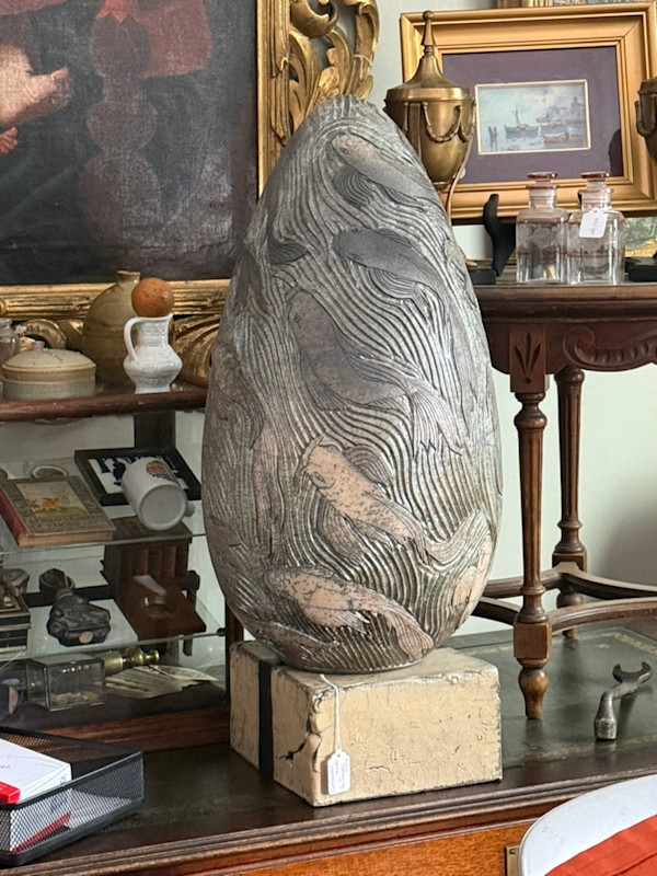 Large Egg Raku sculpture with carved fish by Steve Hemmingway