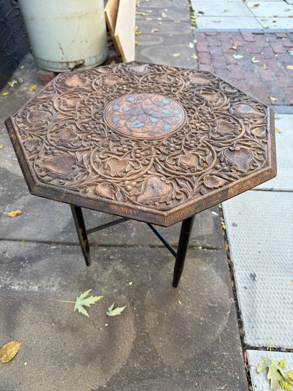 Carved inlaid table with stand