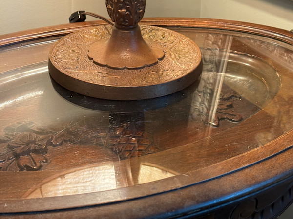 carved oval glass top table with removable tray