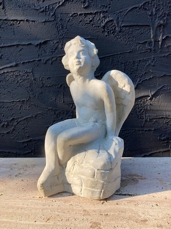 Garden cement  seated angel figure