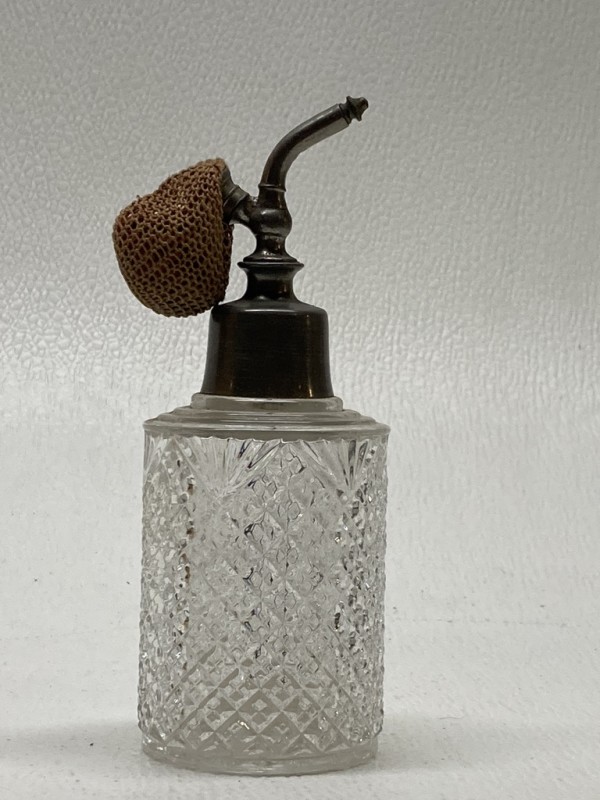 Clear perfume bottle with pewter top