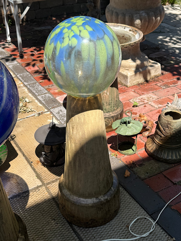 green garden globe on base