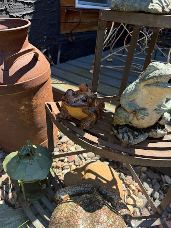 small brown ceramic frog
