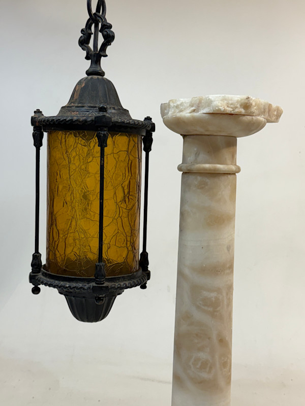1920's entry iron light fixture with amber glass