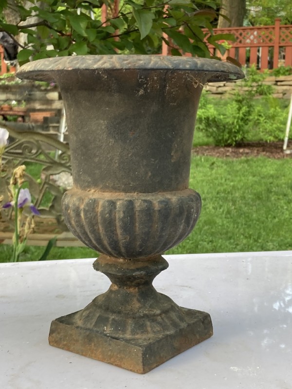 Small iron urn