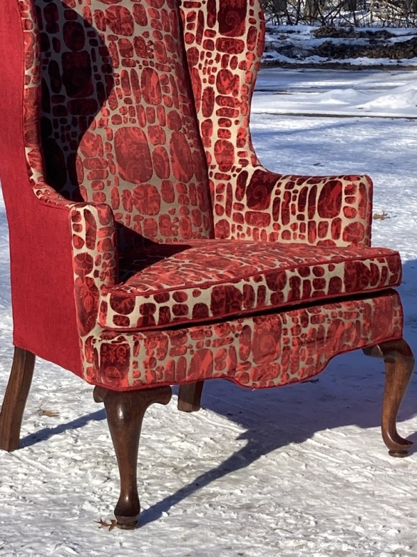 Pair of upholstered wing back chairs