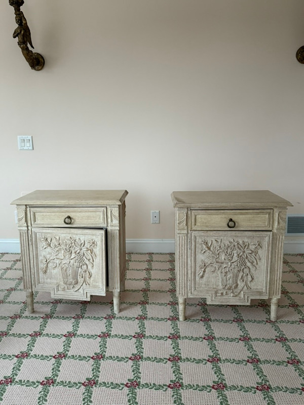 Pair of carved light colored nightstands