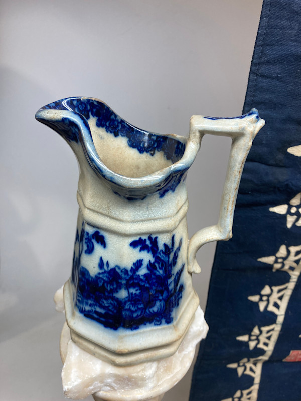 Flow blue pitcher