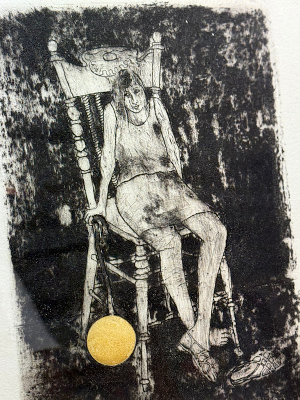 Framed etching of girl in chair