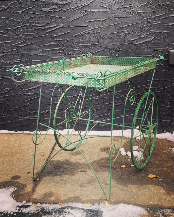 green metal garden cart