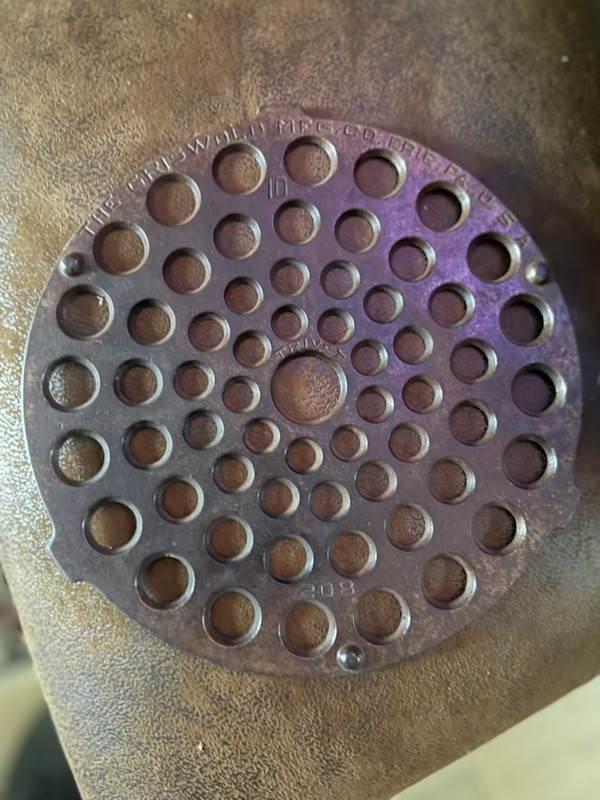 #208 10 Griswold trivet