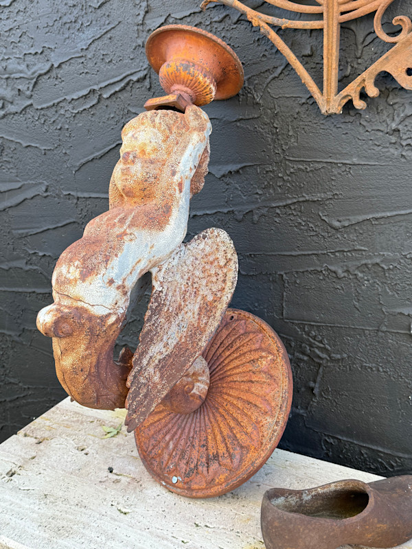 Cast iron garden wall mounted winged cherub