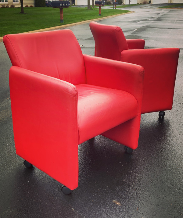 Pair of leather post modern chairs