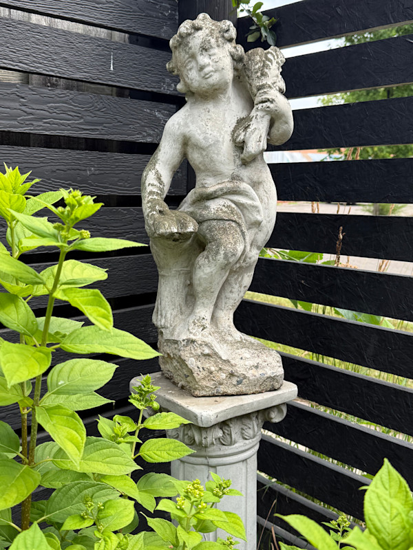Garden cement cherub