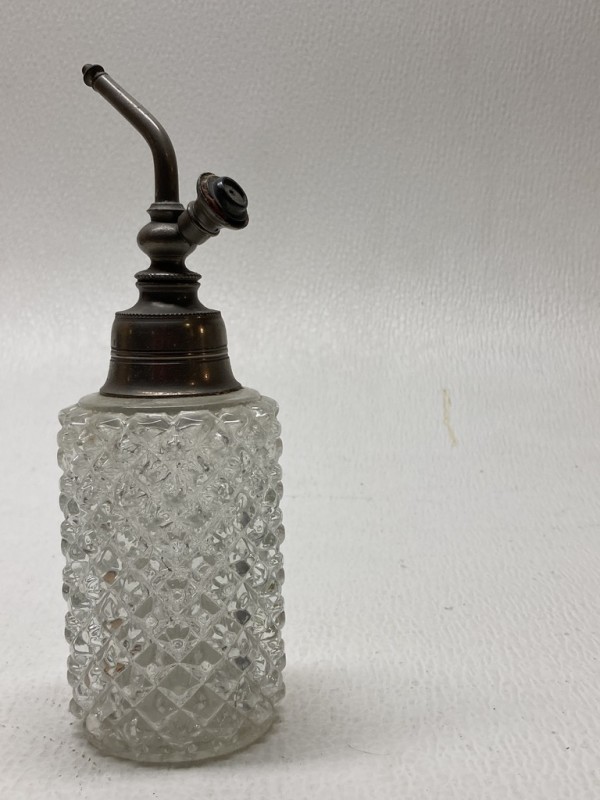 Clear perfume bottle with pewter top