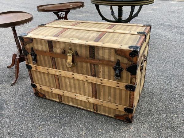 vintage trunk with ticking cloth face