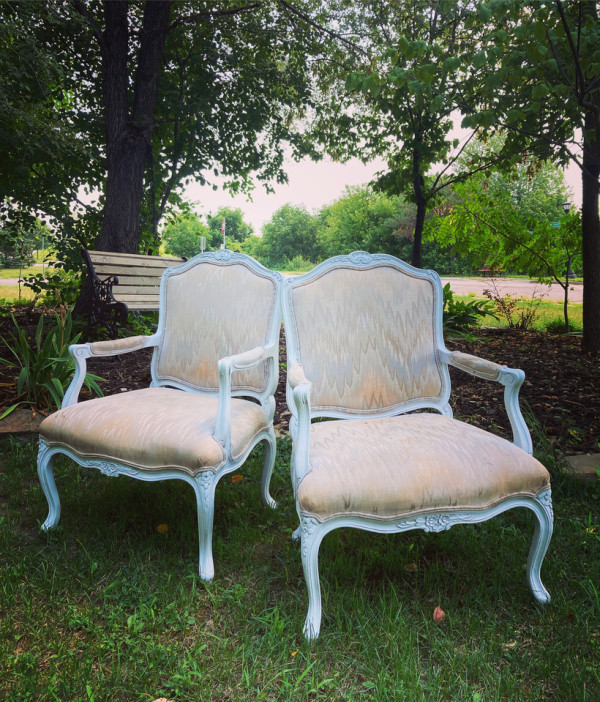 Upholstered white French style chairs