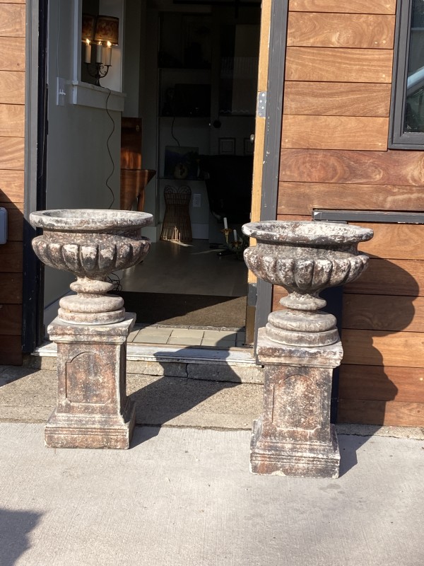 Pair of cement urns