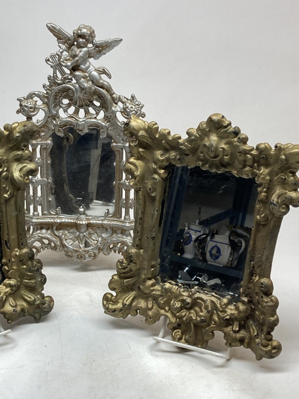 Ornate Victorian iron mirror