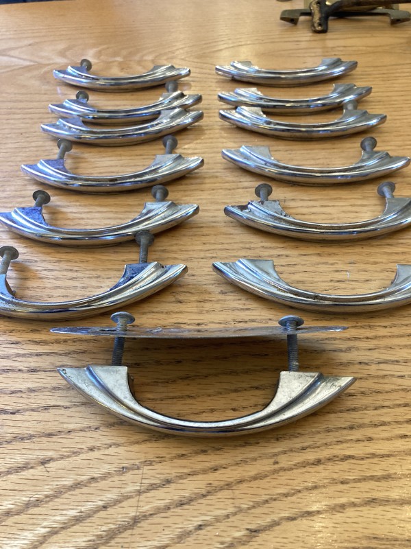 Set of 13 arched silver handles