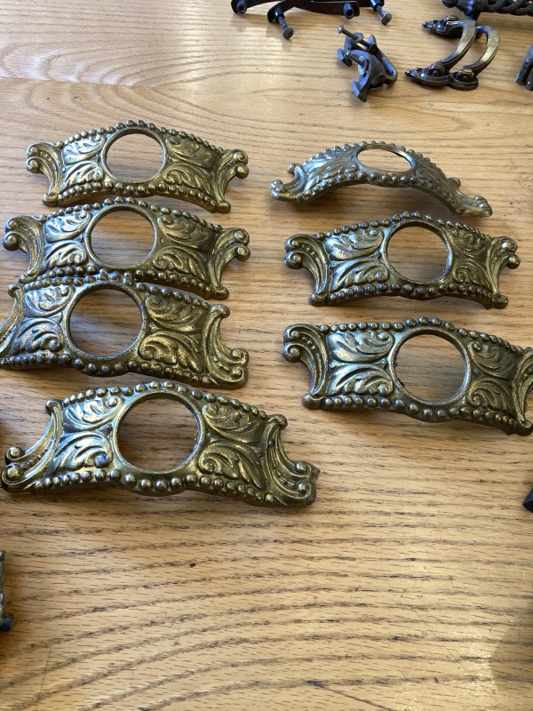 Set of 7 ornate handles