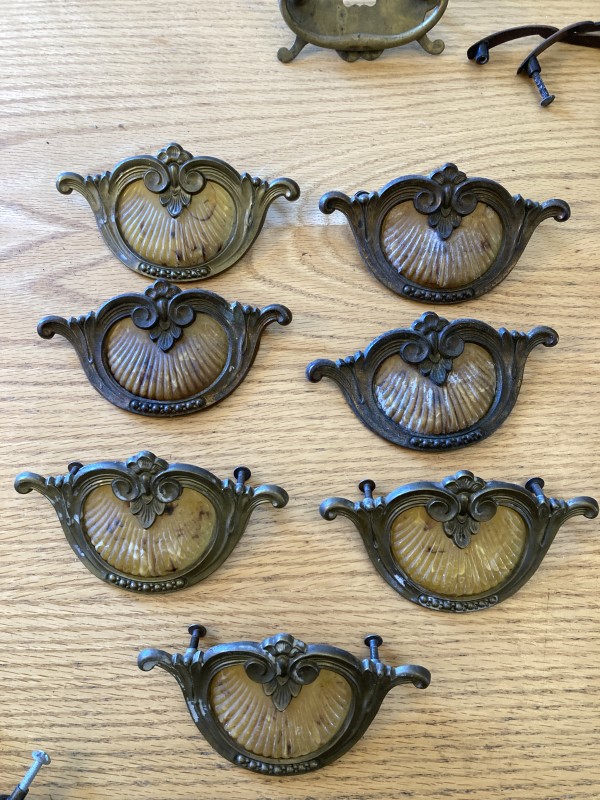 Set of 7 Art Deco ornate handles with bakelite