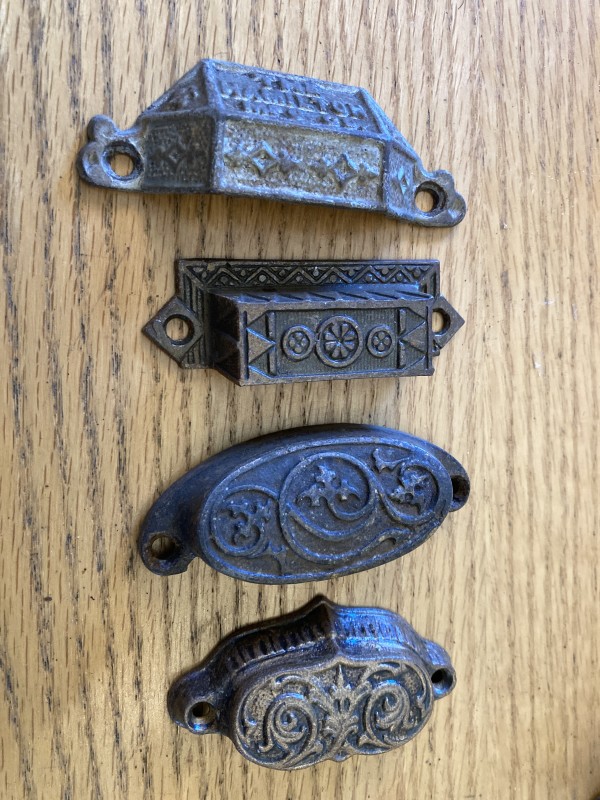 Set of 4 miss matched ornate bale pull handles