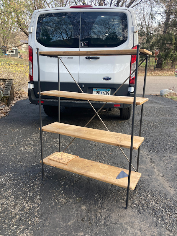 Simple wood and iron open bookcase