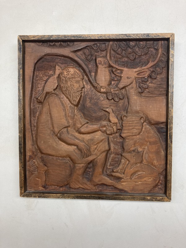 Carved wooden animal and woodsman plaque