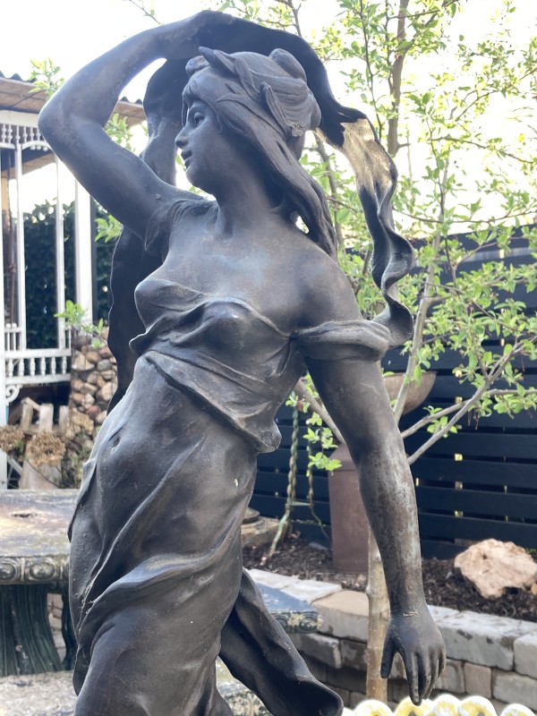 Tall classical specter woman sculpture