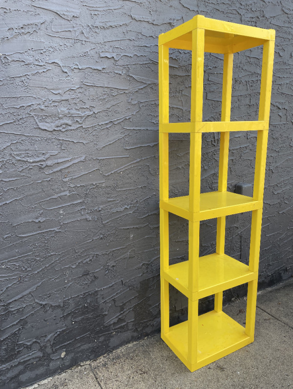 Yellow modular plastic tower display